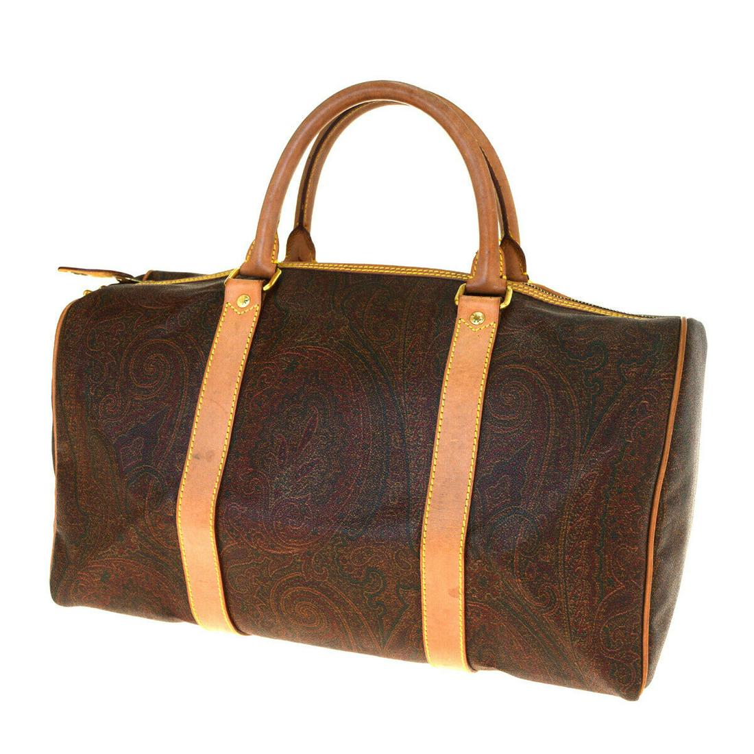 Authentic ETRO PVC Leather Hand bag: Brand: ETRO Material: PVC Leather Style: Hand bag Color: Bordeaux, Size(inch): W 14.6 x H 7.9 x D 7.9 "(approx.) Country of Origin: Italy Come with: - All Bidhaus items come with a 100% money-back aut