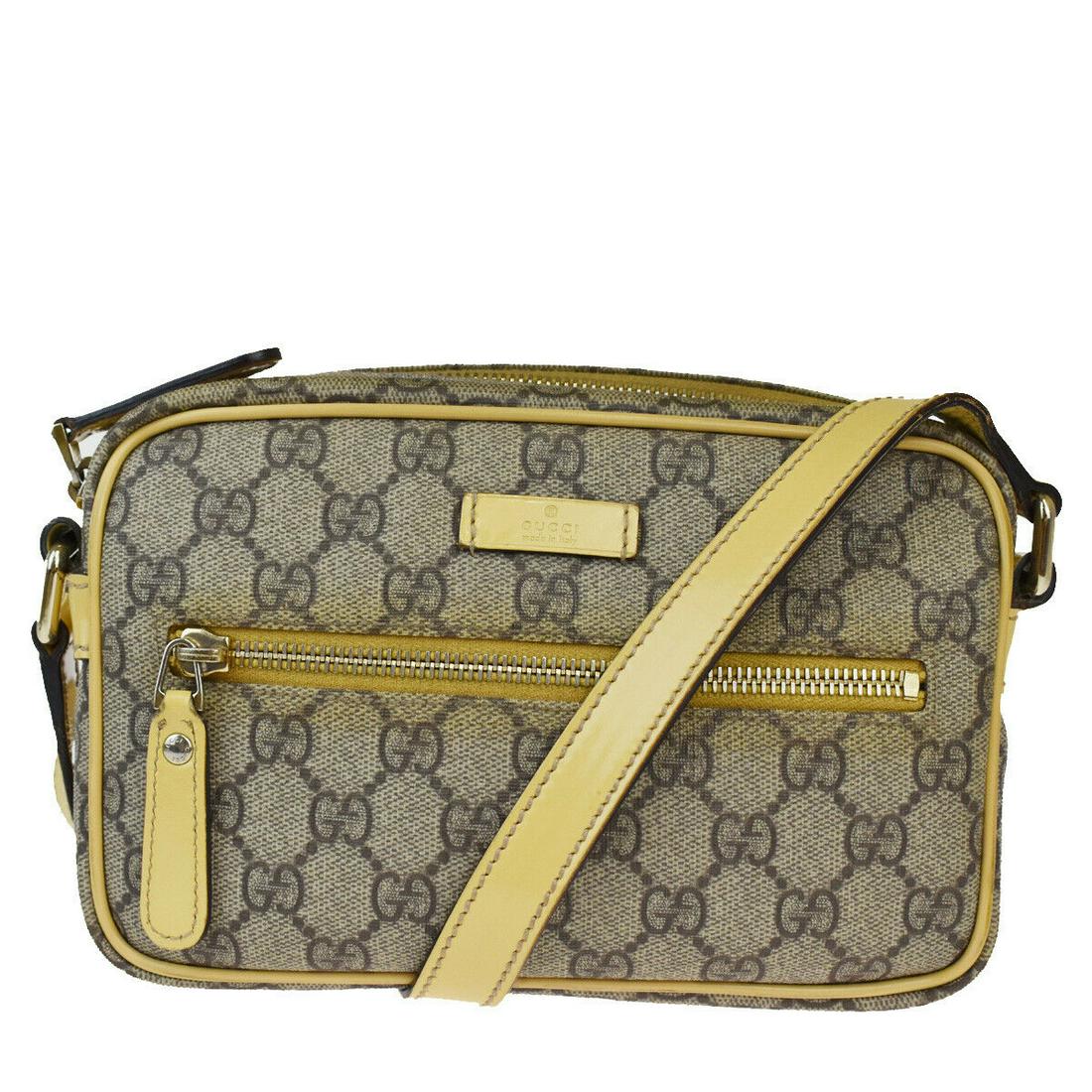 Authentic GUCCI PVC, Patent Leather Shoulder Bag: Brand: GUCCI Material: PVC, Patent Leather Style: Shoulder Bag Color: Brown Size(inch): W 7.9 x H 5.1 x D 1.6 "(approx.) Country of Origin: Italy Come with: - All Bidhaus items come with a 100% money-
