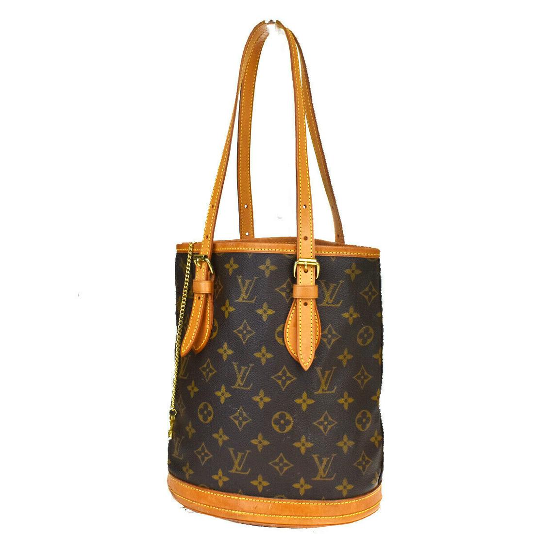 Authentic LOUIS VUITTON BUCKET PM Monogram , Leather: Brand: LOUIS VUITTON Material: Monogram , Leather Style: Shoulder bag Color: Brown Size(inch): W 8.7 x H 9.8 x D 5.9 "(approx.) Country of Origin: France Come with: - All Bidhaus items come with a 100