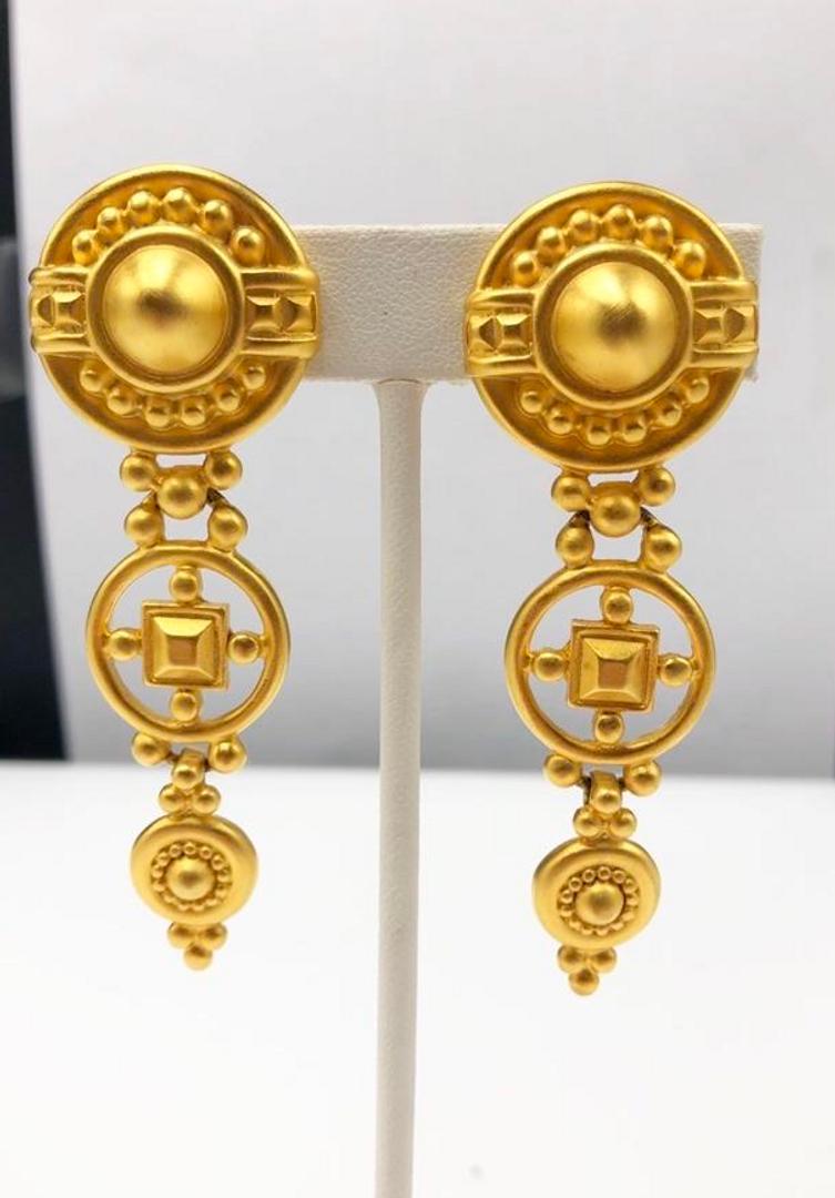 Authentic Givenchy Matte Gold Chandelier Earrings.: Brand: Givenchy Category: Earrings Fastening: Clip On Style: Chandelier Materials: Costume Metal Size: Hallmark: Yes Other Remarks: All Bidhaus items come with a 100% money-back authenticity guarantee