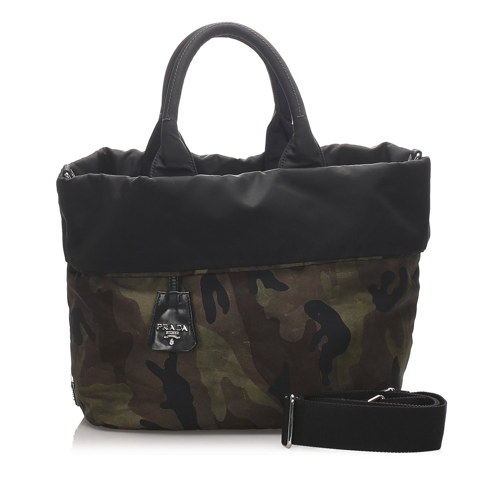 Authentic Prada Reversible Tessuto Camouflage Tote: This tote features a camouflage nylon reversible body, exterior zip pocket, rolled handles, an open top, and an interior zip pocket.Brand: Prada Model: Reversible Tessuto Camouflage Tote Origin: Italy