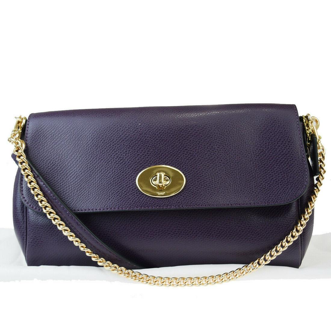 Authentic COACH Leather Shoulder bag: Brand: COACH Material: Leather Style: Shoulder bag Color: Purple Size (HxWxD): 15cm x 23cm x 4cm / 5.9'' x 9.05'' x 1.57'' Country of Origin: Philippines All Bidhaus items come with a 100% money-back 