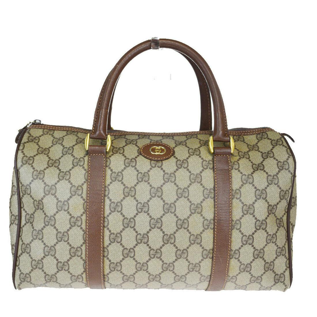 Authentic GUCCI Leather, PVC Shoulder Bag: Brand: GUCCI Material: Leather, PVC Style: Shoulder Bag Color: Brown Size(inch): W 12.6 x H 7.5 x D 5.5 "(approx.) Country of Origin: Italy Come with: - All Bidhaus items come with a 100% money-back a