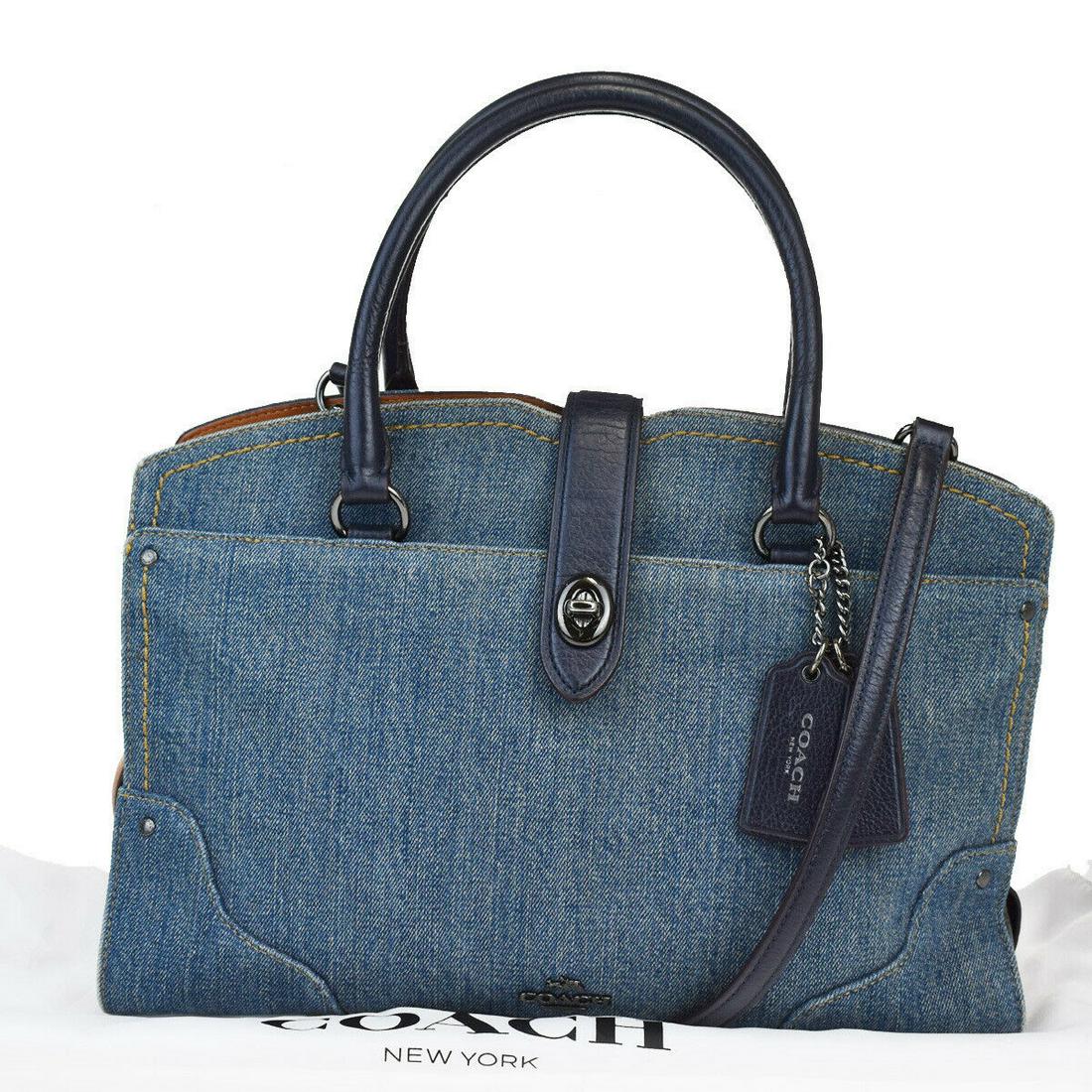 Authentic COACH Denim, Leather Handbag: Brand: COACH Material: Denim, Leather Style: Handbag Color: Blue Size (HxWxD): 19cm x 30cm x 15cm / 7.48'' x 11.81'' x 5.9'' Country of Origin: China All Bidhaus items come with a 100% money-back auth