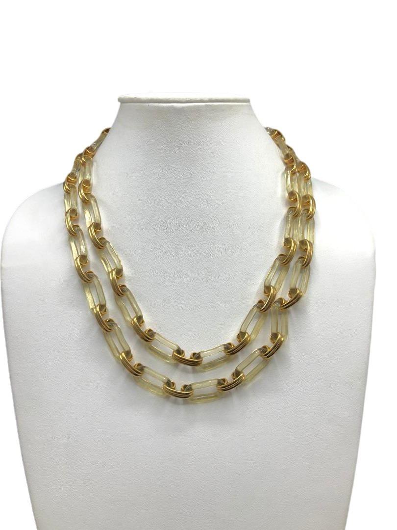 Authentic Yves Saint Laurent Clear Lucite Chain Link: Brand: YSL Style: Chain Hallmark:: Yes, hang tag Fastening: Hook Category: Necklace Materials: Lucite, Costume Metal Size: Other Remarks: Can be worn as a necklace, long/doubled or as a belt. All Bidh