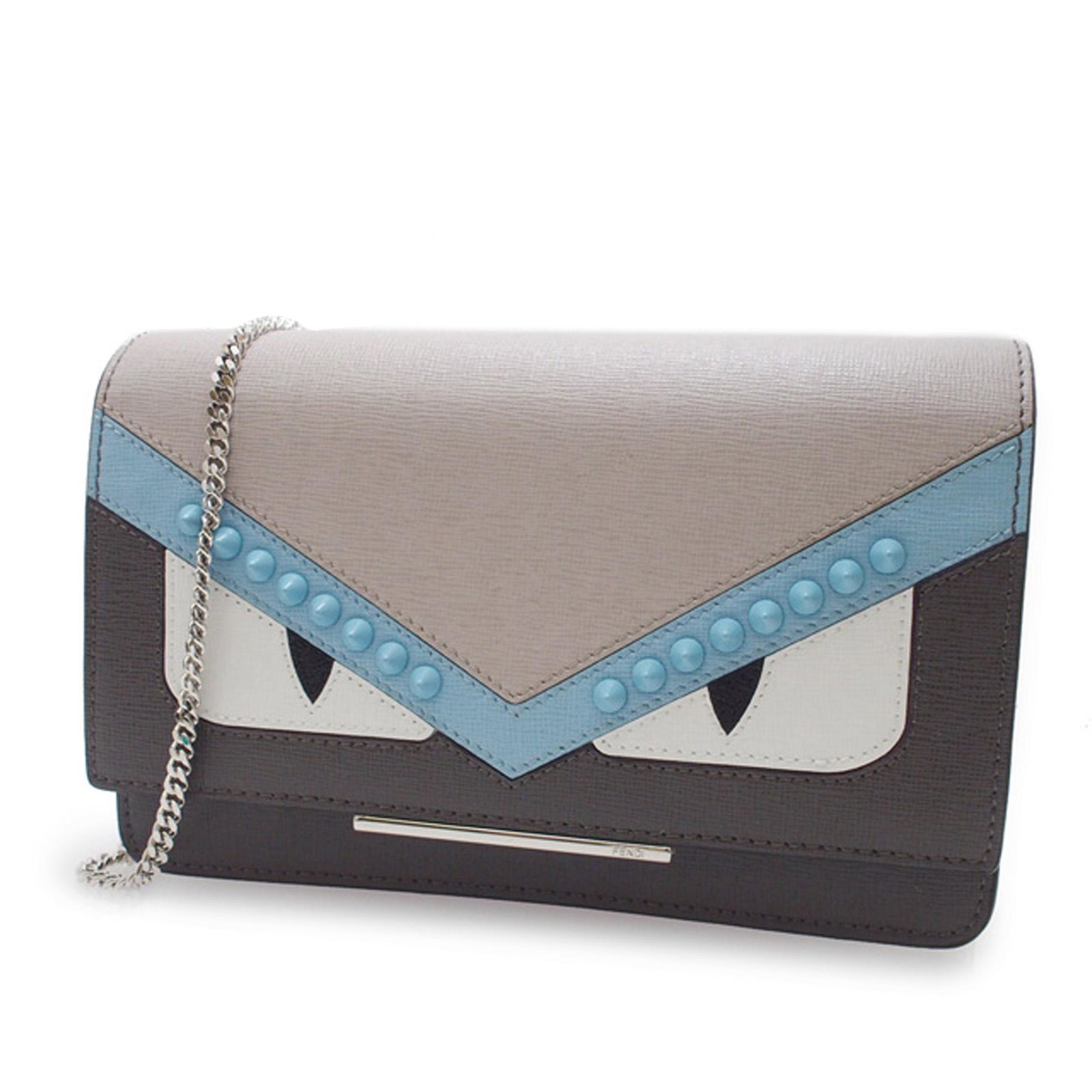 Authentic Fendi Monster Leather Wallet On Chain: This wallet on chain features a leather body, a silver-tone chain strap, a front flap with a magnetic snap button closure, and interior zip and slip compartments.Brand: Fendi Model: Monster Leather Wa