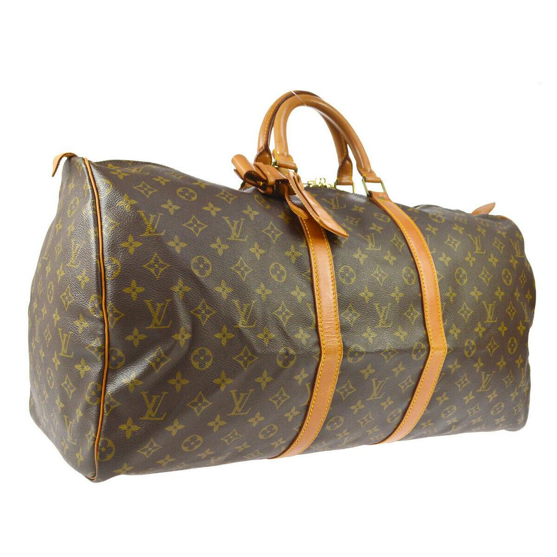 Authentic LOUIS VUITTON Monogram Canvas, Leather Travel: Brand: LOUIS VUITTON Material: Monogram Canvas, Leather Style: Travel Hand Bag Color: Brown Size(inch): W21.9 x H12.2 x D9.4 " Size(inch): W 21.9 x H 12.2 x D 9.4 "Handle Drop. 4.3 " Country of Origin