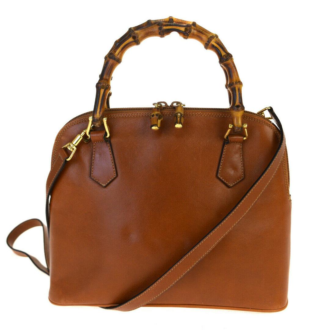 Authentic GUCCI Bamboo, Leather Shoulder Bag: Brand: GUCCI Material: Bamboo, Leather Style: Shoulder bag Color: Brown Size(inch): W 10.2 x H 7.9 x D 3.5 "(approx.) Country of Origin: Italy Come with: Shoulder strap All Bidhaus items come with a 1