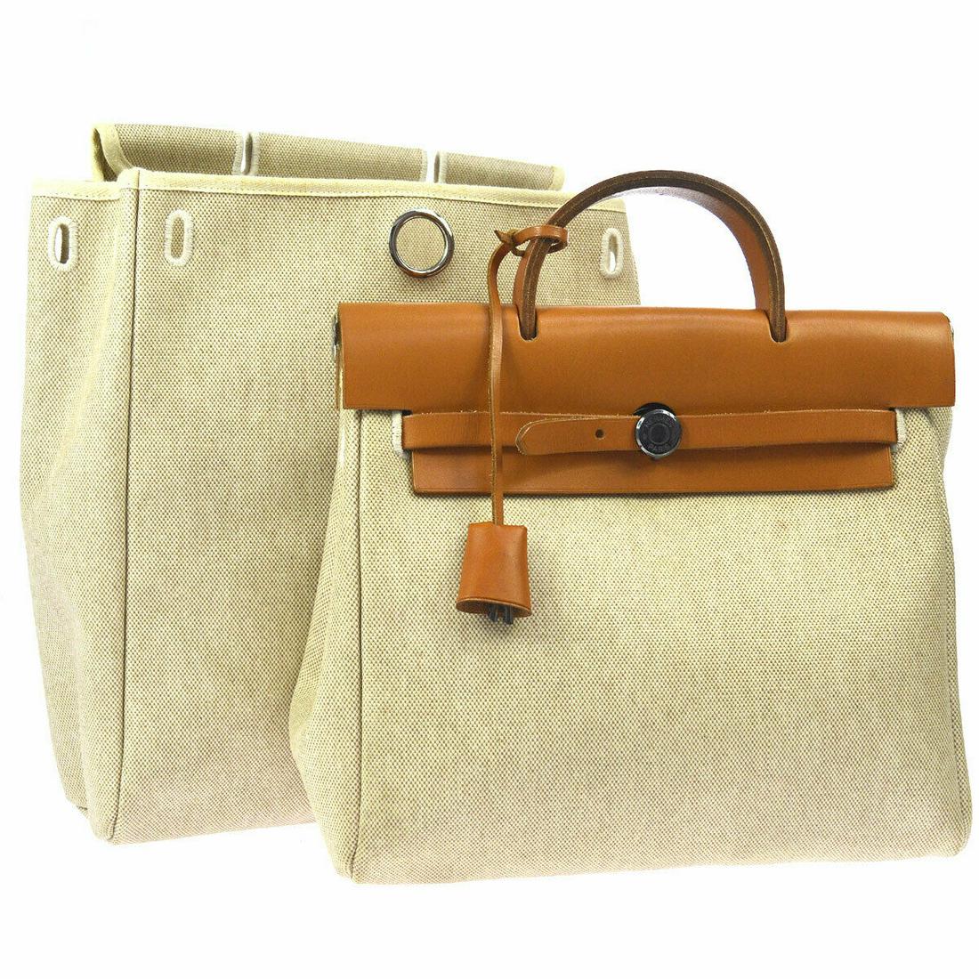 Authentic HERMES BACKPACK Toile H, Leather, Canvas: Brand: HERMES Material: Toile H, Leather, Canvas Style: Backpack Style Color: Beige, Brown Size(inch): W 11.0 x H 9.4 or 13.8 x D 4.3 "Handle Drop. 2.8 " Country of Origin: France Come with: Cover of 