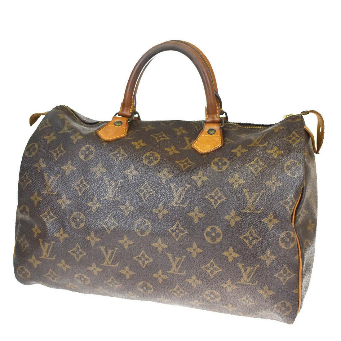 Authentic LOUIS VUITTON SPEEDY 35 Monogram Leather Hand: Brand: LOUIS VUITTON Material: Monogram Leather Style: Hand bag Color: Brown Size(inch): W 13.8 x H 9.4 x D 7.1"(approx.) Country of Origin: France Come with: - All Bidhaus items come with a 100% mone