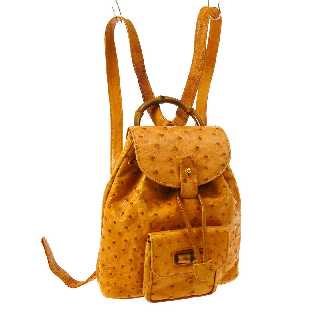 Authentic GUCCI BACKPACK Ostrich Leather Backpack: Brand: GUCCI Material: Ostrich Leather Style: Backpack Color: Brown Size(inch): W8.3 x H9.4 x D3.0 " Size(inch): W 8.3 x H 9.4 x D 3.0 "Handle Drop. 2.4 "Strap total length. 23.6 - 29.5 " Country of O