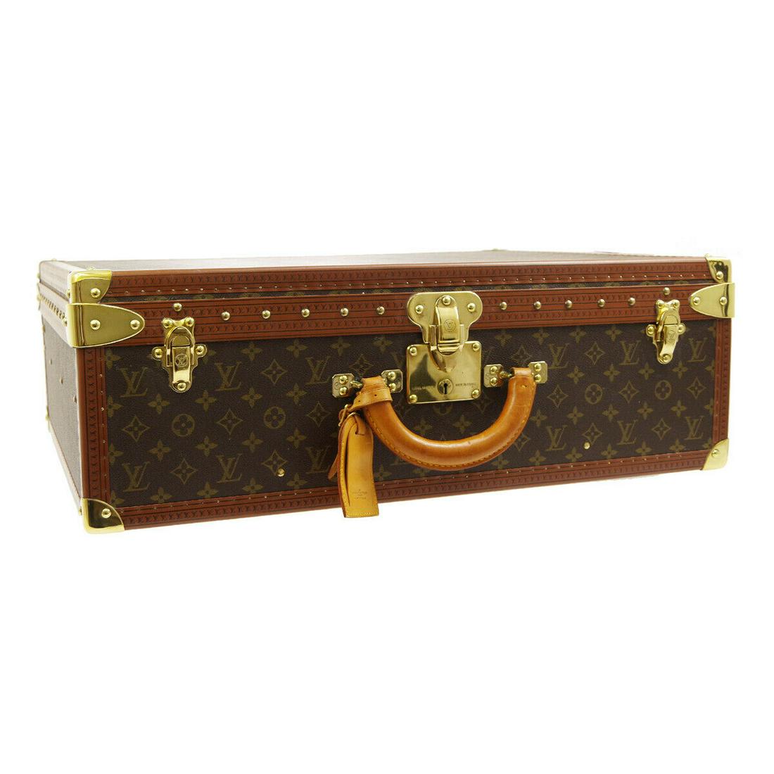 Authentic LOUIS VUITTON Monogram Canvas, Leather, Metal: Brand: LOUIS VUITTON Material: Monogram Canvas, Leather, Metal Style: Trunk Color: Brown Size(inch): W25.6 x H20.3 x D8.9 " / Strap Drop: 2.8 Country of Origin: France Come with: Name Tag, Keys*3, Han