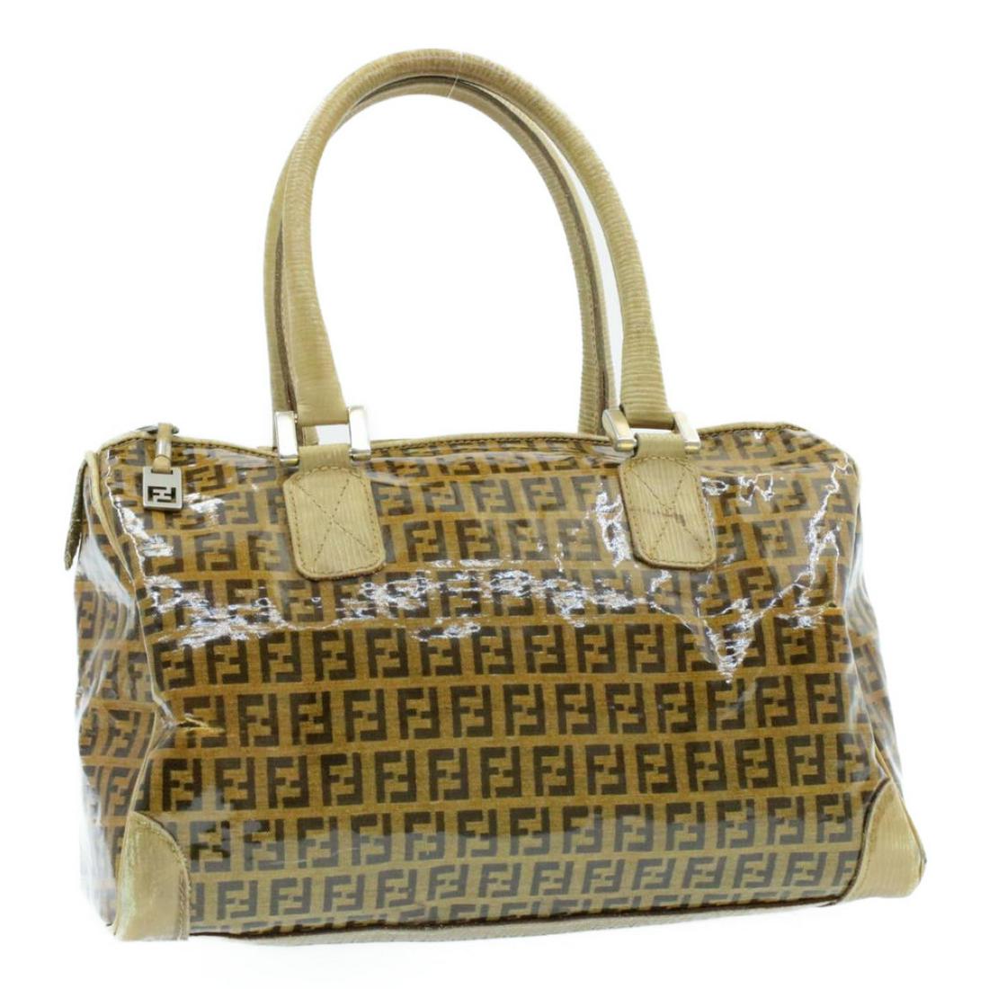 Authentic FENDI Enamel Hand Bag: Brand: FENDI Material: Enamel Style: Hand Bag Color: Brown Size(inch): W11.81 x H6.69 x D6.69inch(Approx) Country of Origin: â€“ Accessory: There is no item box and dust bag. We will send only th