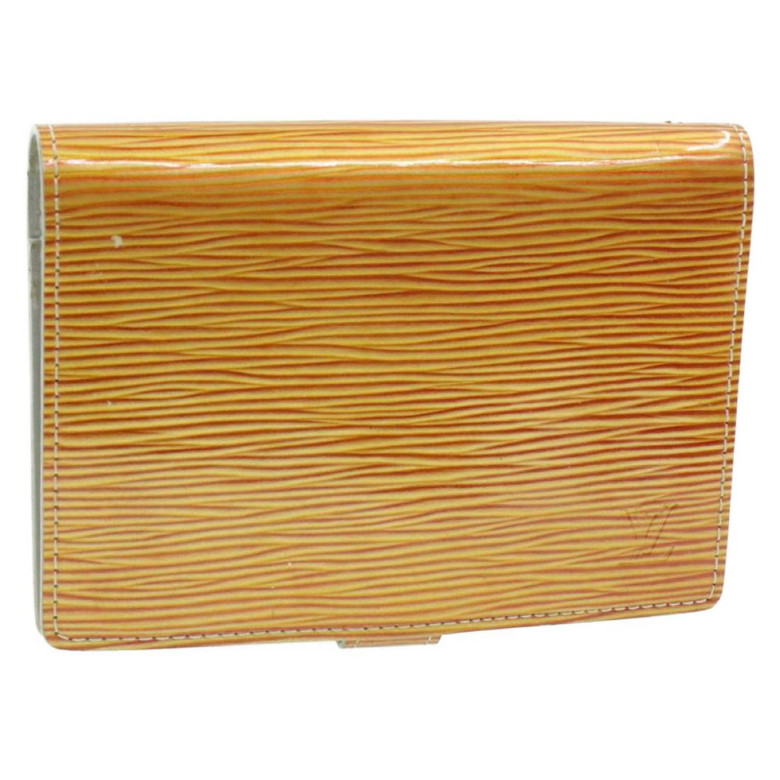 Authentic LOUIS VUITTON Cyber Epi Leather Day Planner: Brand: LOUIS VUITTON Material: Cyber Epi Leather Style: Day Planner Cover Color: Orange Size(inch): W3.9 x H5.7 x D0.6â€³(Approx) Country of Origin: Spain Accessory: There is no item box and dust