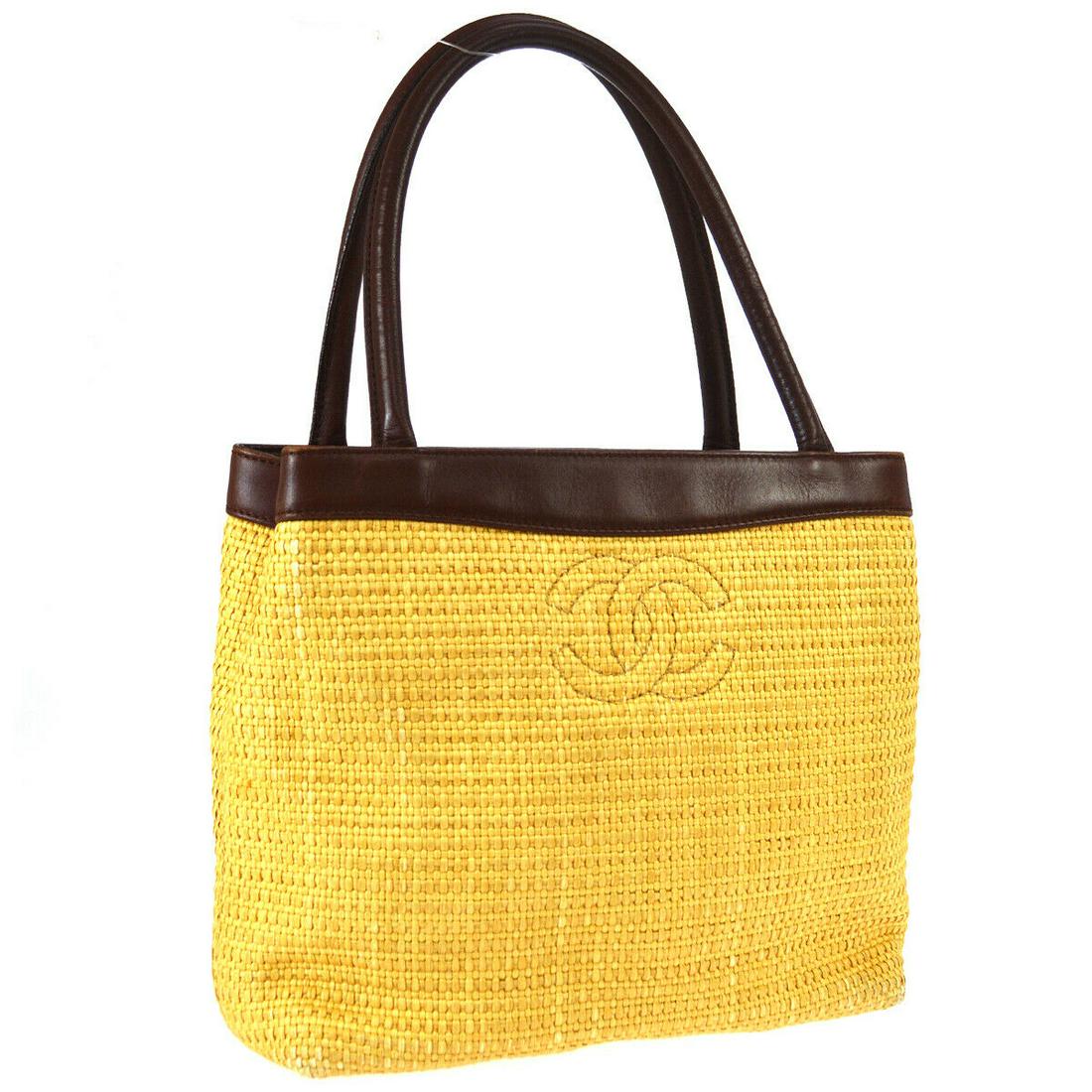 Authentic CHANEL Raffia, Leather Hand Tote Bag: Brand: CHANEL Material: Raffia, Leather Style: Hand Tote Bag Color: Beige, Brown Size(inch): W9.4 x H8.7 x D3.1 " / Strap Drop: 5.5 Size(inch): W 9.4 x H 8.7 x D 3.1 "Handle Drop. 5.5 " Country of Ori