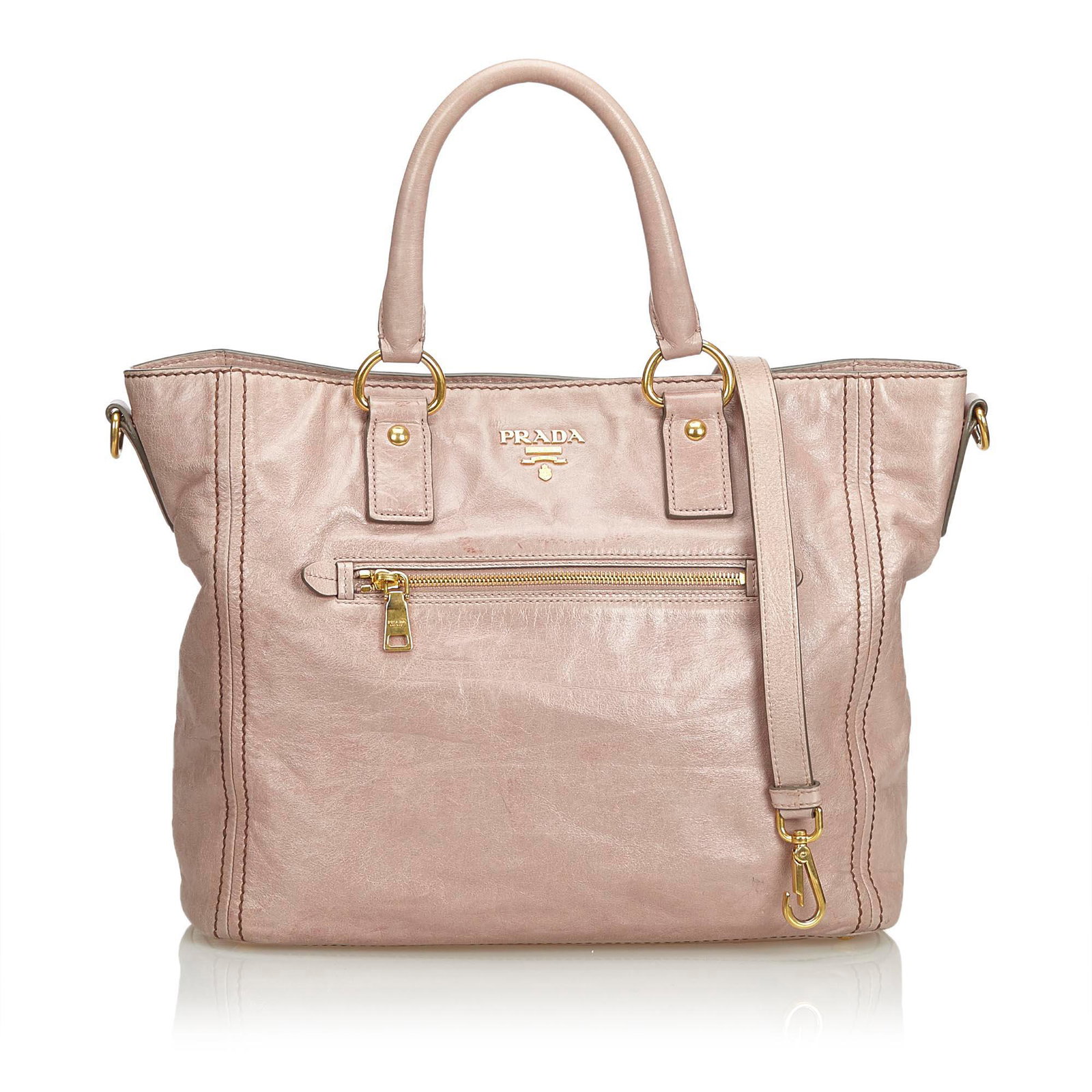Authentic Prada Leather Satchel: This satchel features a leather body, a front exterior zip pocket, rolled handles, a detachable flat leather strap, top zip closure, and interior zip and slip pockets.Brand: Prada Model: Leather Satch