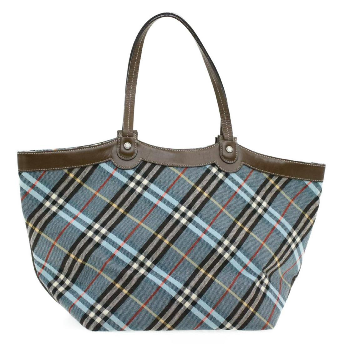 Authentic BURBERRY Canvas Hand Bag: Brand: BURBERRY Material: Canvas Style: Hand Bag Color: Blue Size(inch): W10.62 x H7.87 x D7.08inch(Approx) Country of Origin: â€“ Accessory: There is no item box and dust bag. We will send only