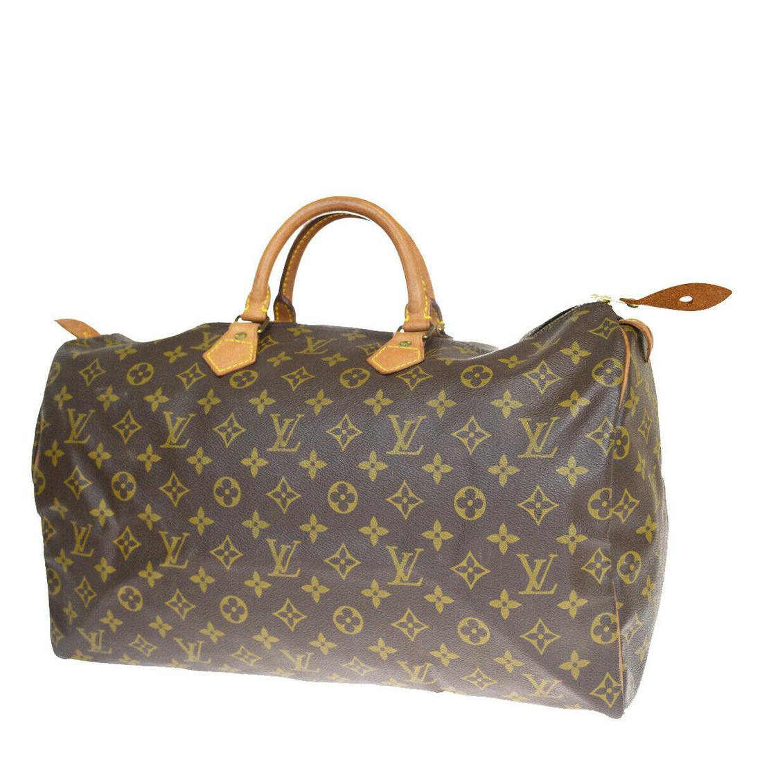 Authentic LOUIS VUITTON SPEEDY 40 Monogram Leather Hand: Brand: LOUIS VUITTON Material: Monogram Leather Style: Hand Bag Color: Brown Size(inch): W 15.7 x H 9.8 x D 7.5 "(approx.) Country of Origin: France Come with: - All Bidhaus items come with a 100% mon
