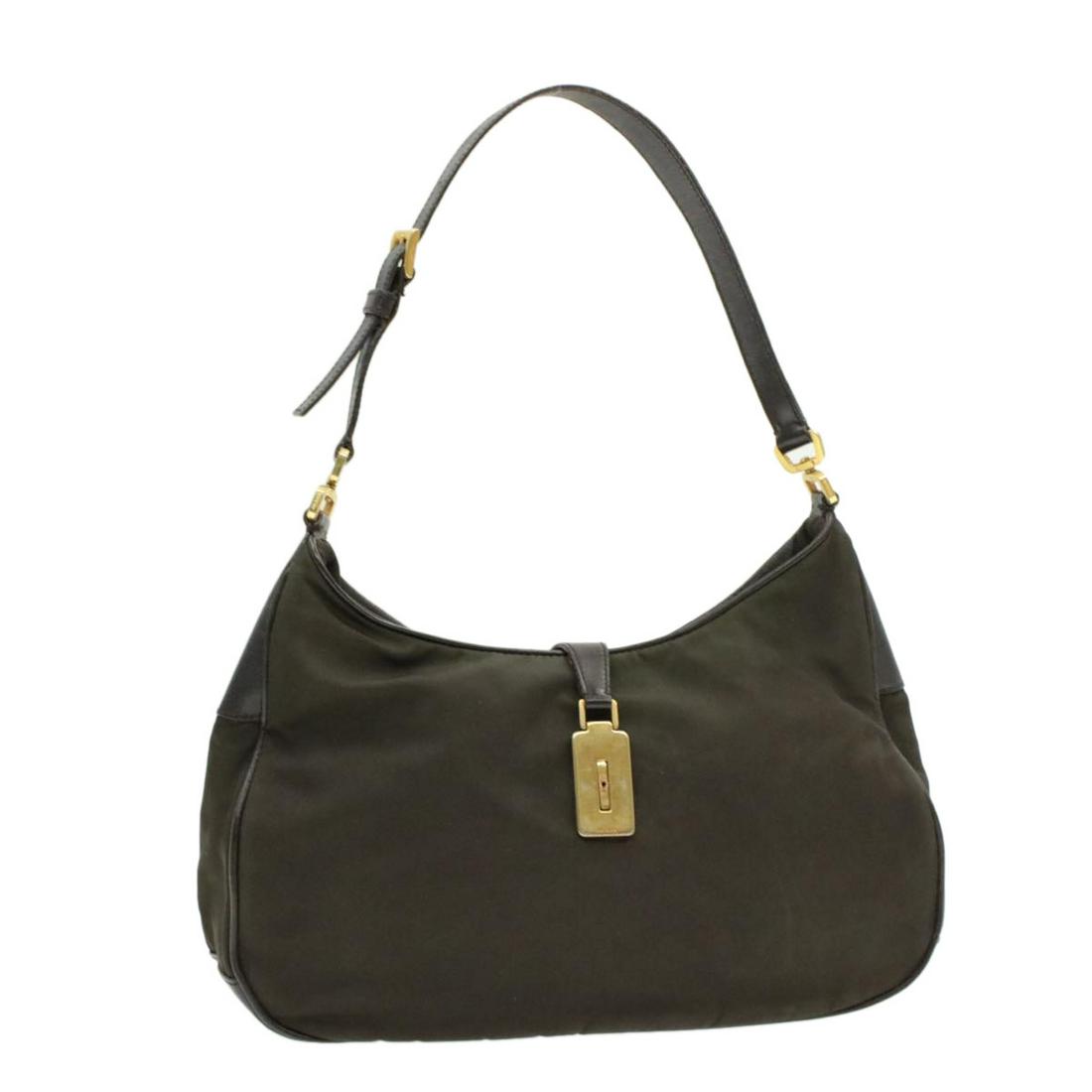 Authentic PRADA Nylon Shoulder Bag: Brand: PRADA Material: Nylon Style: Shoulder Bag Color: Khaki Size(inch): W11.81 x H7.08 x D3.14inch / Shoulder Drop 7.87inch(Approx) Country of Origin: Italy Accessory: There is no item box and dust 