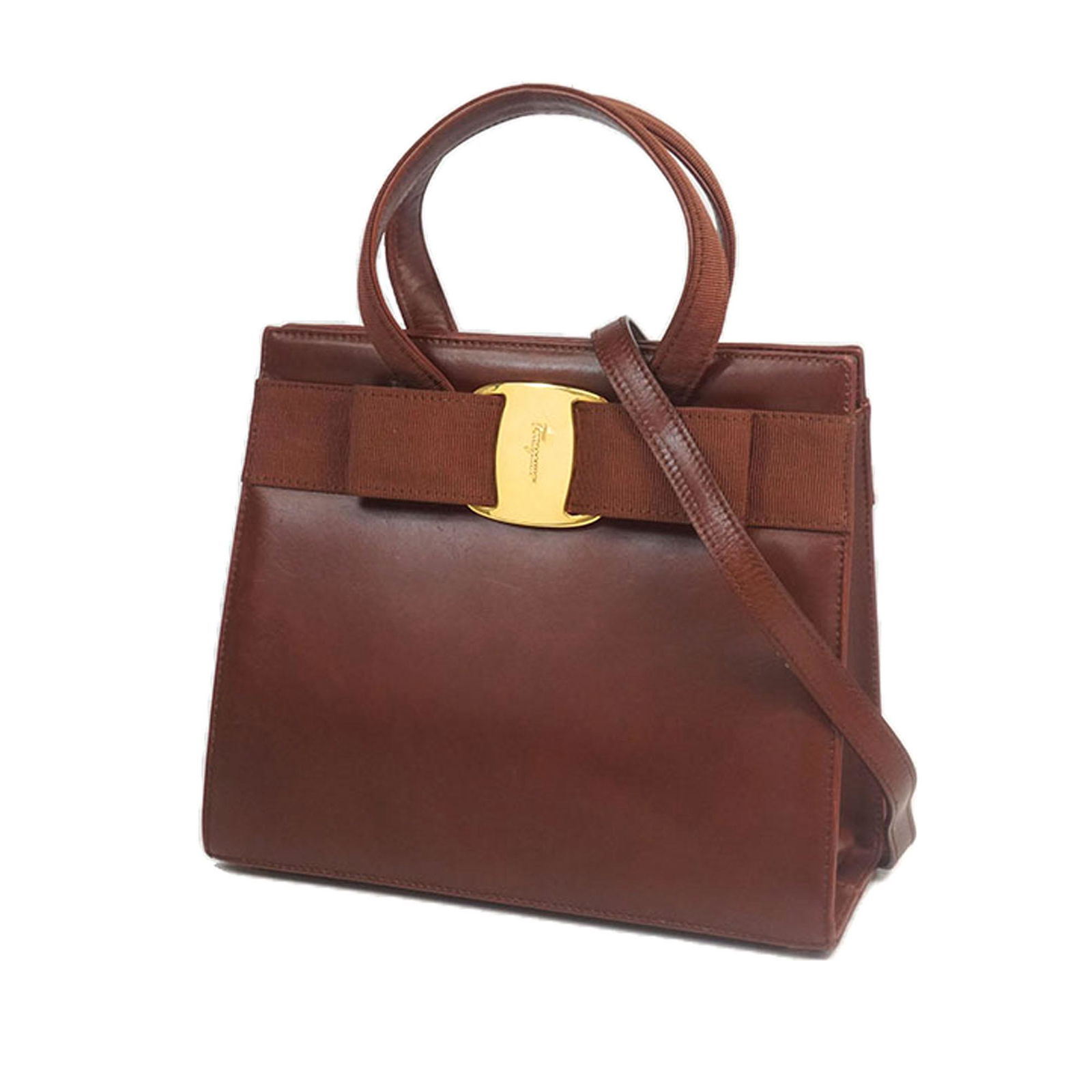 Authentic Ferragamo Leather Vara Satchel: This satchel features a leather body, a flat top handle, a detachable flat strap, double magnetic snap button closures, and an interior zip pocket.Brand: Ferragamo Model: Leather Vara Satchel Origin: