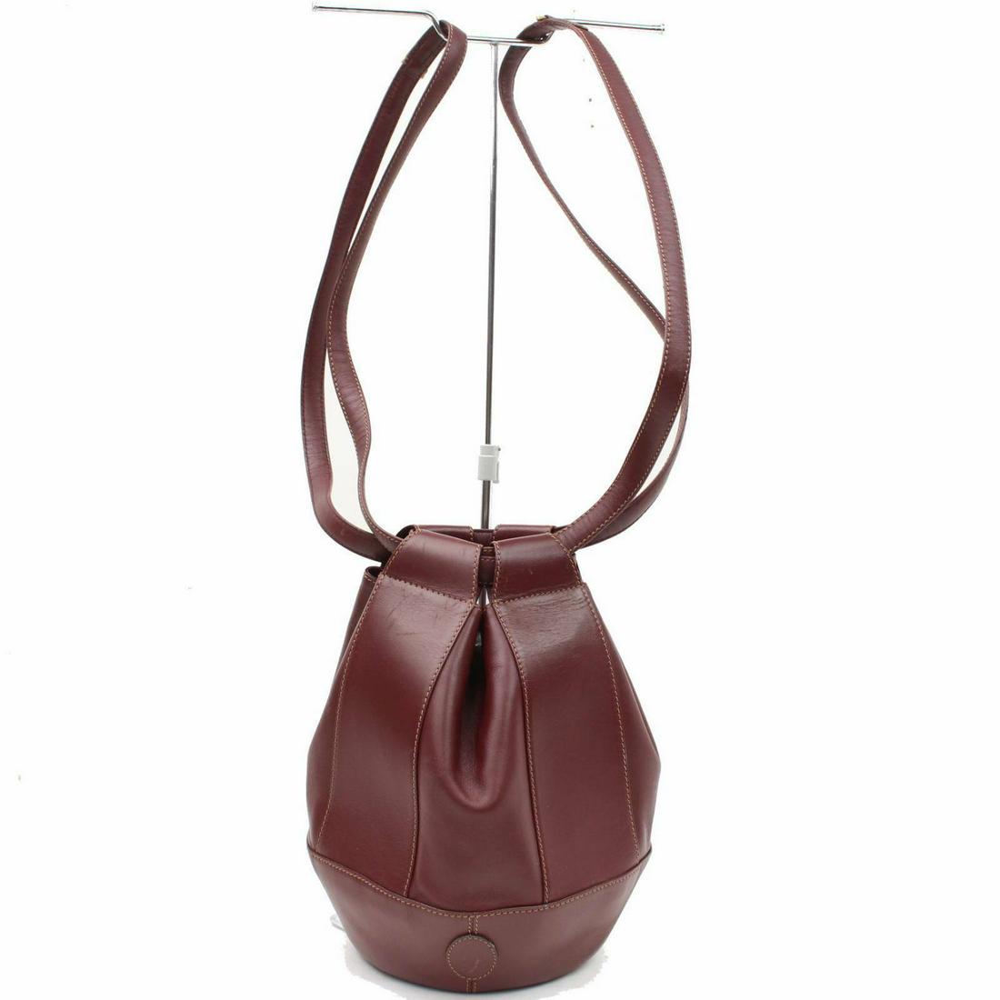 Authentic CARTIER Leather Shoulder Bag: Brand: CARTIER Material: Leather Style: Shoulder Bag Color: Burgundy Size(inch): W10.6 inch(approx) /27 cm(approx) x H10.0 inch(approx) /25.5 cm(approx) x D5.90 inch(approx) /15 cm(approx) " / Strap D