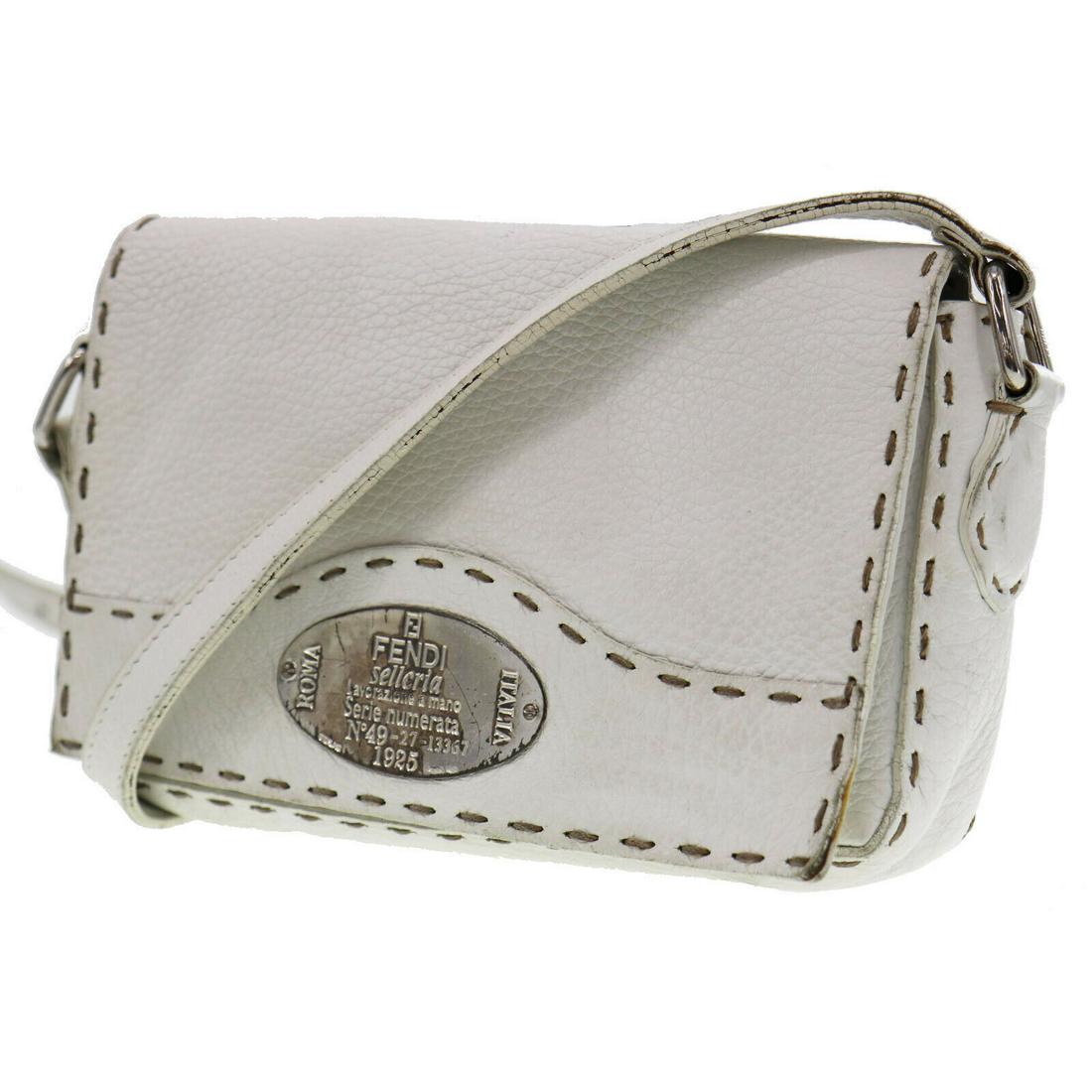 Authentic FENDI VINTAGE Leather Crossbody: Brand: FENDI Material: Leather Style: Crossbody Color: White Size(Inch): H 4.3 x D 1.5 x L 7.0Shoulder : 36.2 - 50.4 Country of Origin: Italy Come with: - All Bidhaus items come with a 100% money-back