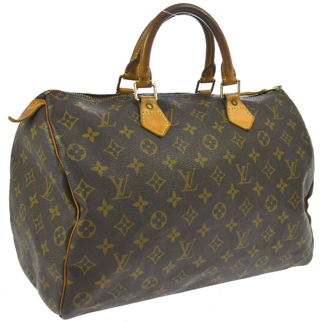 Authentic LOUIS VUITTON SPEEDY Monogram Canvas, Leather: Brand: LOUIS VUITTON Material: Monogram Canvas, Leather Style: Hand Bag Color: Brown Size(inch): W14.2 x H9.1 x D7.5 " / Strap Drop: 3.5 Size(inch): W 14.2 x H 9.1 x D 7.5 "Handle Drop. 3.5 " Country 