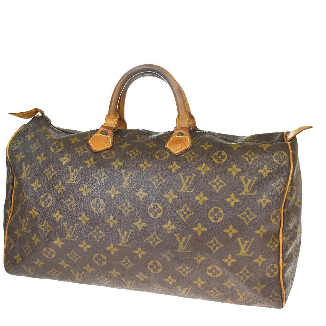 Authentic LOUIS VUITTON SPEEDY 40 Monogram Leather Hand: Brand: LOUIS VUITTON Material: Monogram Leather Style: Hand Bag Color: Brown Size(inch): W 15.7 x H 9.8 x D 7.5 "(approx.) Country of Origin: France Come with: - All Bidhaus items come with a 100% mon