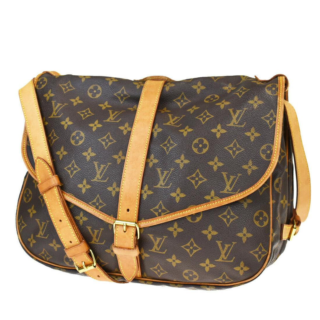 Authentic LOUIS VUITTON SAUMUR 35 Monogram Leather: Brand: LOUIS VUITTON Material: Monogram Leather Style: Shoulder Bag Color: Brown Size(inch): W 13.8 x H 10.2 x D 7.9 "(approx.) Country of Origin: France Come with: - All Bidhaus items come with a 100