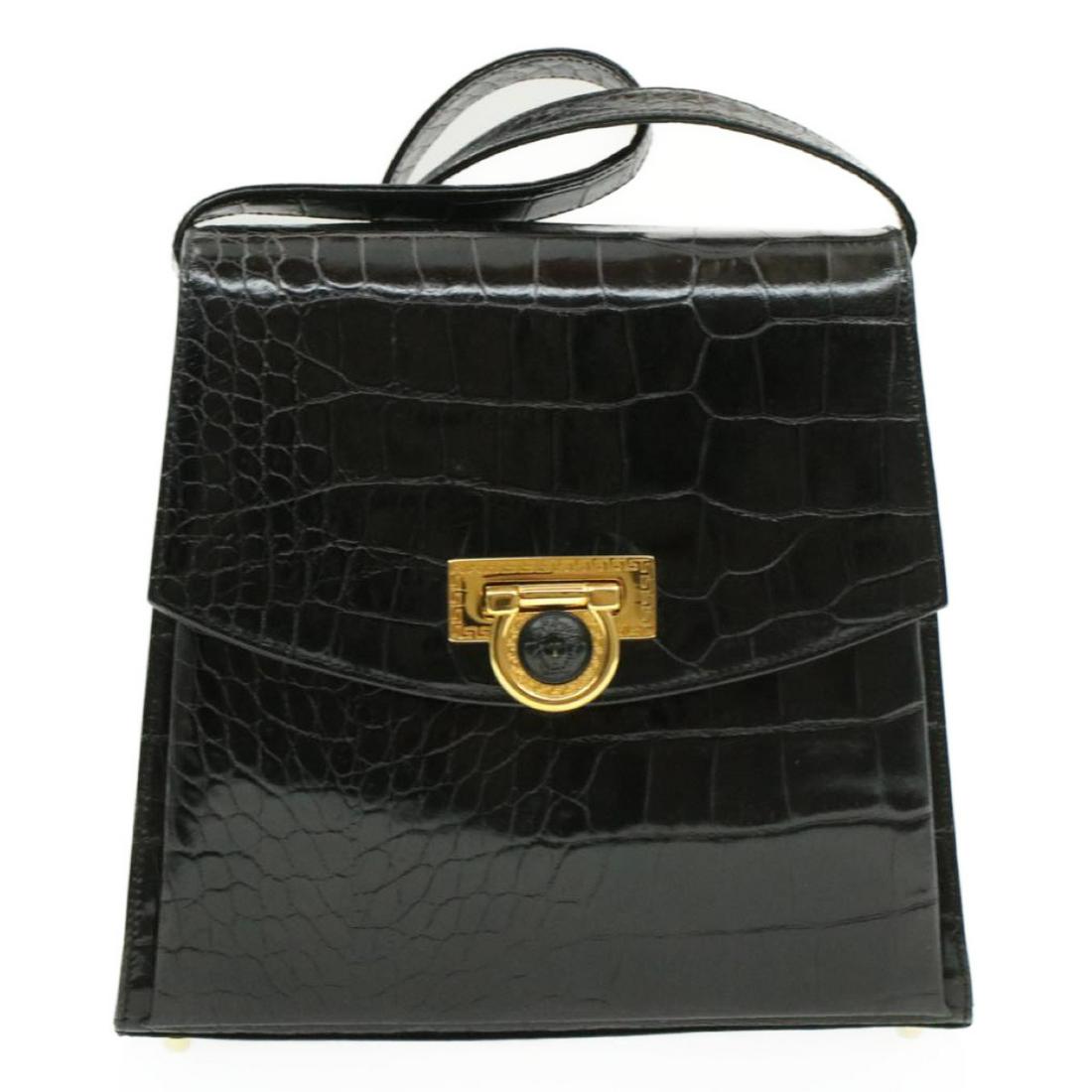 Authentic GIANNI VERSACE Leather Shoulder Bag: Brand: GIANNI VERSACE Material: Leather Style: Shoulder Bag Color: Black Size(inch): W9.44 x H8.66 x D3.54inch / Shoulder Drop 18.11inch(Approx) Country of Origin: Italy Accessory: There is no item bo