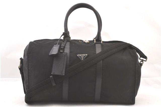 Authentic PRADA Nylon Travel Bag: Brand: PRADA Material: Nylon Style: Travel Bag Color: Black Size(inch): W19.1 x H13.4 x D6.3" / Handle Drop 5.5"(Approx) Country of Origin: Italy Accessory: Padlock and Keys All Bidhaus items come wit