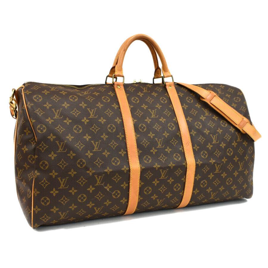 Authentic LOUIS VUITTON Canvas Hand Bag: Brand: LOUIS VUITTON Material: Canvas Style: Hand Bag Color: Brown Size(inch): W:23.6"Ã—H:12.6"Ã—D:10.2"Handle:12.6"Strap drop:47.2" Come with: Shoulder Strap All Bidhaus items come with a 100% 