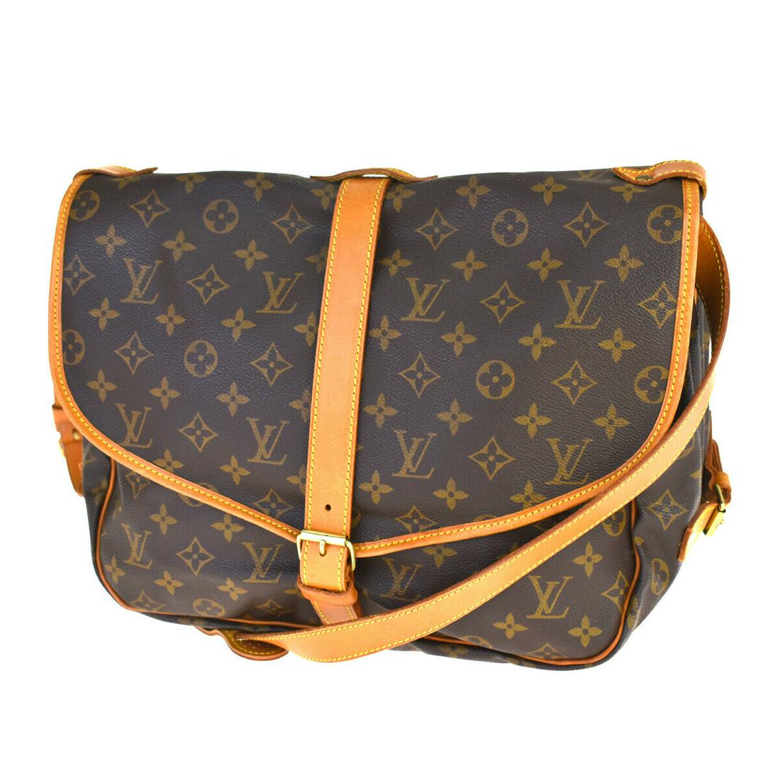 Authentic LOUIS VUITTON SAUMUR 35 Monogram Leather: Brand: LOUIS VUITTON Material: Monogram Leather Style: Shoulder Bag Color: Brown Size(inch): W 13.8 x H 10.2 x D 7.9 "(approx.) Country of Origin: France Come with: - All Bidhaus items come with a 100