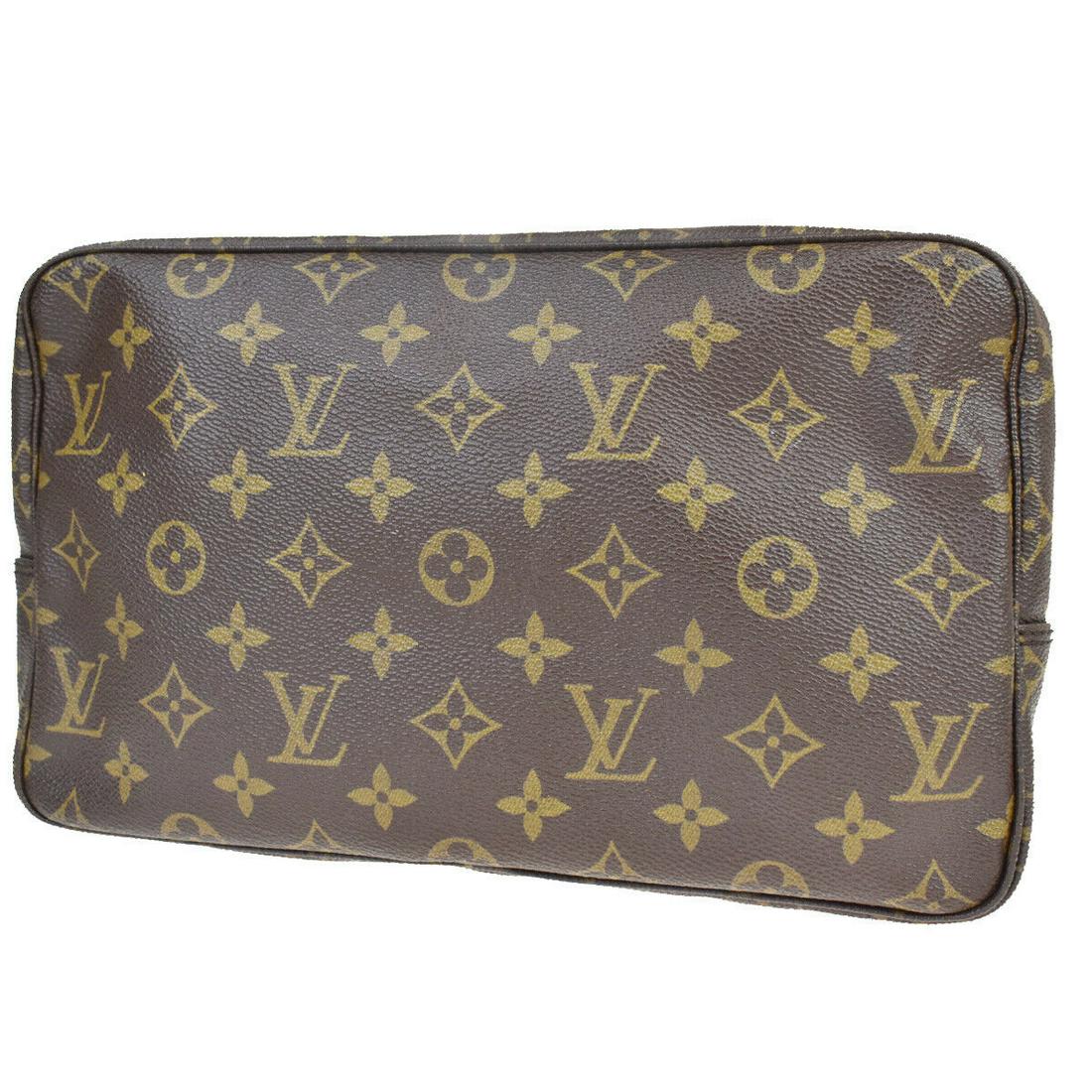 Authentic LOUIS VUITTON TROUSSE Monogram , Leather Hand: Brand: LOUIS VUITTON Material: Monogram , Leather Style: Hand Bag Color: Browns Size(inch): W 11.0 x H 6.7 x D 2.8 "(approx.) Country of Origin: France Come with: - All Bidhaus items come with a 100% 