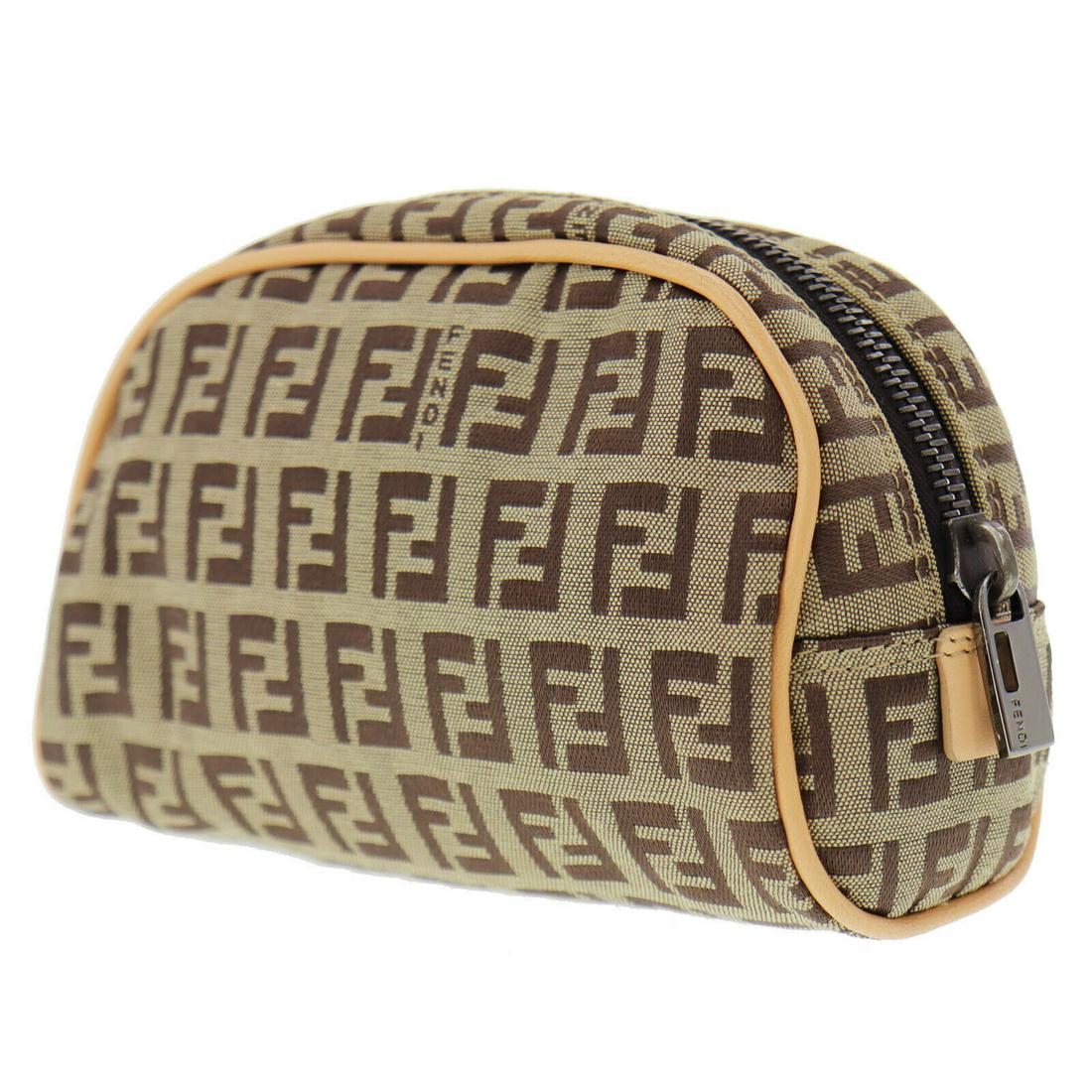 Authentic FENDI VINTAGE Canvas Mini Pouch: Brand: FENDI Material: Canvas Style: Mini Pouch Color: Beige Size(Inch): H 3.5 x D 2.3 x L 5.9 Country of Origin: Italy Come with: - All Bidhaus items come with a 100% money-back authenticity guarante