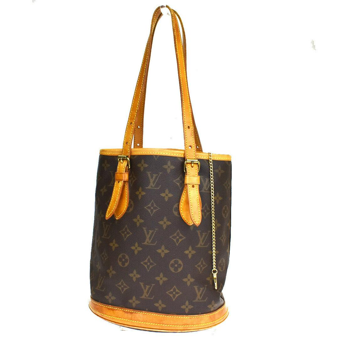 Authentic LOUIS VUITTON BUCKET PM Monogram , Leather: Brand: LOUIS VUITTON Material: Monogram , Leather Style: Shoulder bag Color: Brown Size(inch): W 8.7 x H 9.8 x D 5.9 "(approx.) Country of Origin: France Come with: - All Bidhaus items come with a 100