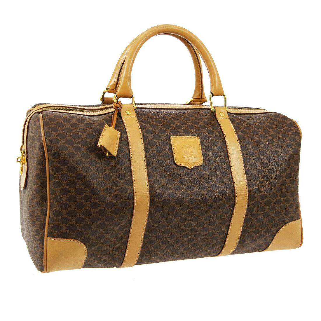 Authentic CELINE PVC, Leather Travel Hand Bag: Brand: CELINE Material: PVC, Leather Style: Travel Hand Bag Color: Browns Size(inch): W15.7 x H8.7 x D8.3 " Size(inch): W 15.7 x H 8.7 x D 8.3 "Handle Drop. 6.3 " Country of Origin: Italy Come with: K