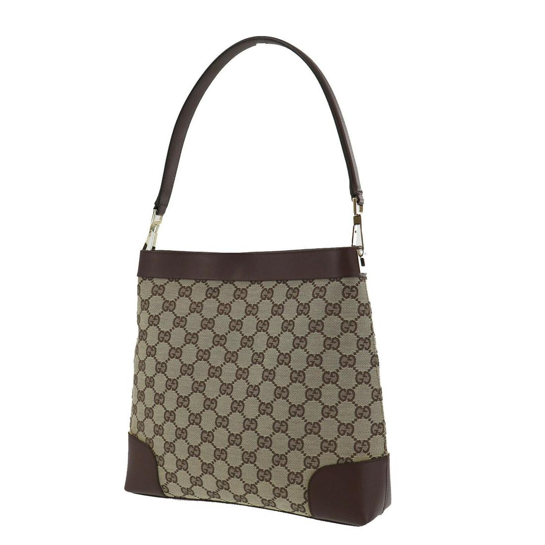 Authentic GUCCI VINTAGE Canvas, Leather Shoulder Bag: Brand: GUCCI Material: Canvas, Leather Style: Shoulder Bag Color: Brown Size(Inch): H 10.4 x D 2.5 x L 11.0Shoulder: 21.6 Country of Origin: Italy Come with:- All Bidhaus items come with a 100% money-