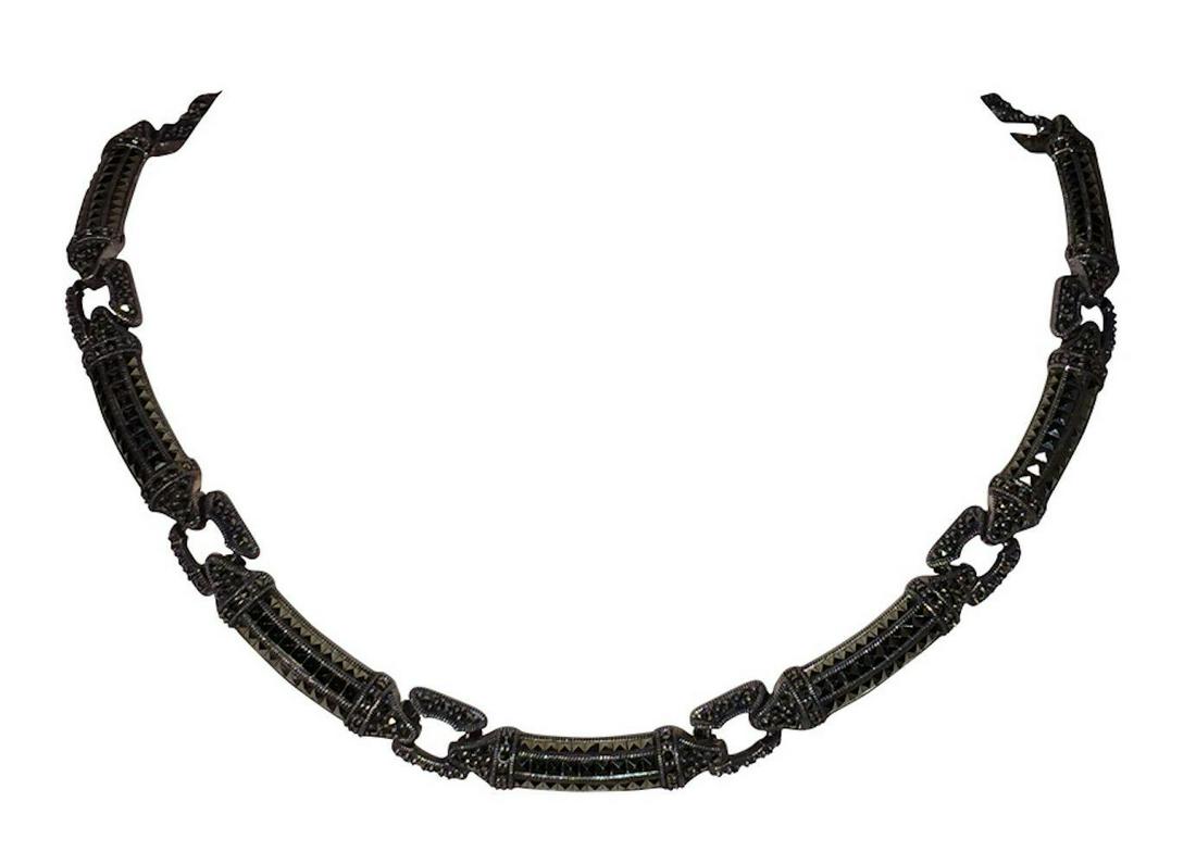 Authentic JUDITH JACK Sterling Silver and Marcasite: Brand: JUDITH JACK Stunning sterling silver Judith Jack necklace with pave round and pyramid marcasites.Necklace is in mint condition and perfectly fits around the necklace.Measures 17" long and 1/2"