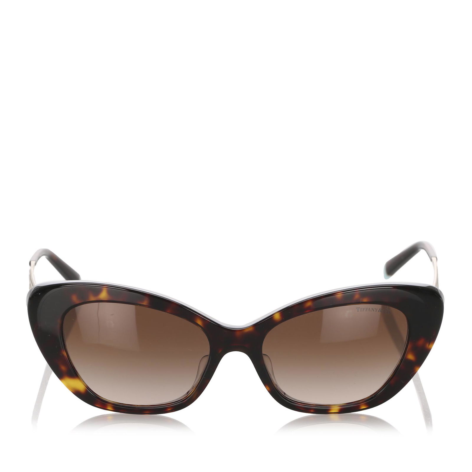 Authentic Tiffany Cat Eye Tinted Sunglasses: These sunglasses feature an acetate body with tinted lenses.Brand: Tiffany Model: Cat Eye Tinted Sunglasses Origin: United States of America Category: Sunglasses Color: Brown Style: Others Material: P