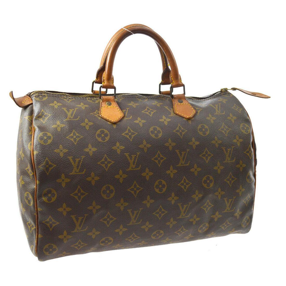 Authentic LOUIS VUITTON SPEEDY 35 Monogram Canvas,: Brand: LOUIS VUITTON Material: Monogram Canvas, Leather Style: Hand Bag Color: Brown Size(inch): W14.2 x H9.1 x D7.5 " Size(inch): W 14.2 x H 9.1 x D 7.5 "Handle Drop. 3.5 " Country of Origin: France 