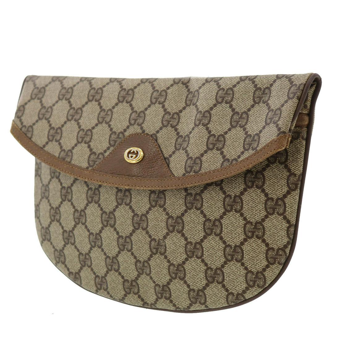 Authentic GUCCI VINTAGE PVC Leather Clutch: Brand: GUCCI Material: PVC Leather Style: Clutch Color: Brown Size(Inch): H 7.0 x D 0.7 x L 9.8 Country of Origin: Italy Come with: - All Bidhaus items come with a 100% money-back authenticity guarant