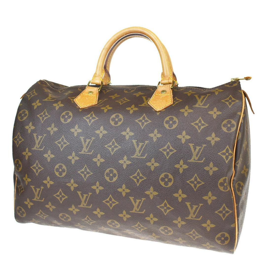 Authentic LOUIS VUITTON SPEEDY 35 Monogram Leather Hand: Brand: LOUIS VUITTON Material: Monogram Leather Style: Hand bag Color: Brown Size(inch): W 13.8 x H 9.4 x D 7.1"(approx.) Country of Origin: France Come with: - All Bidhaus items come with a 100% mone