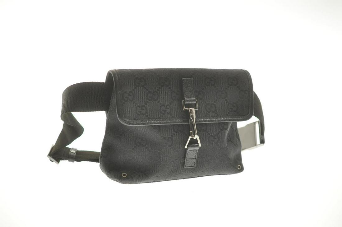 Authentic GUCCI GG Canvas Waist Bag: Brand: GUCCI Material: GG Canvas Style: Waist Bag Color: Black Size(inch): W6.69 x H5.11 x D2.36â€³ / Waist 27.55-40.15â€³(Approx) Country of Origin: Italy Accessory: There is no item box and 
