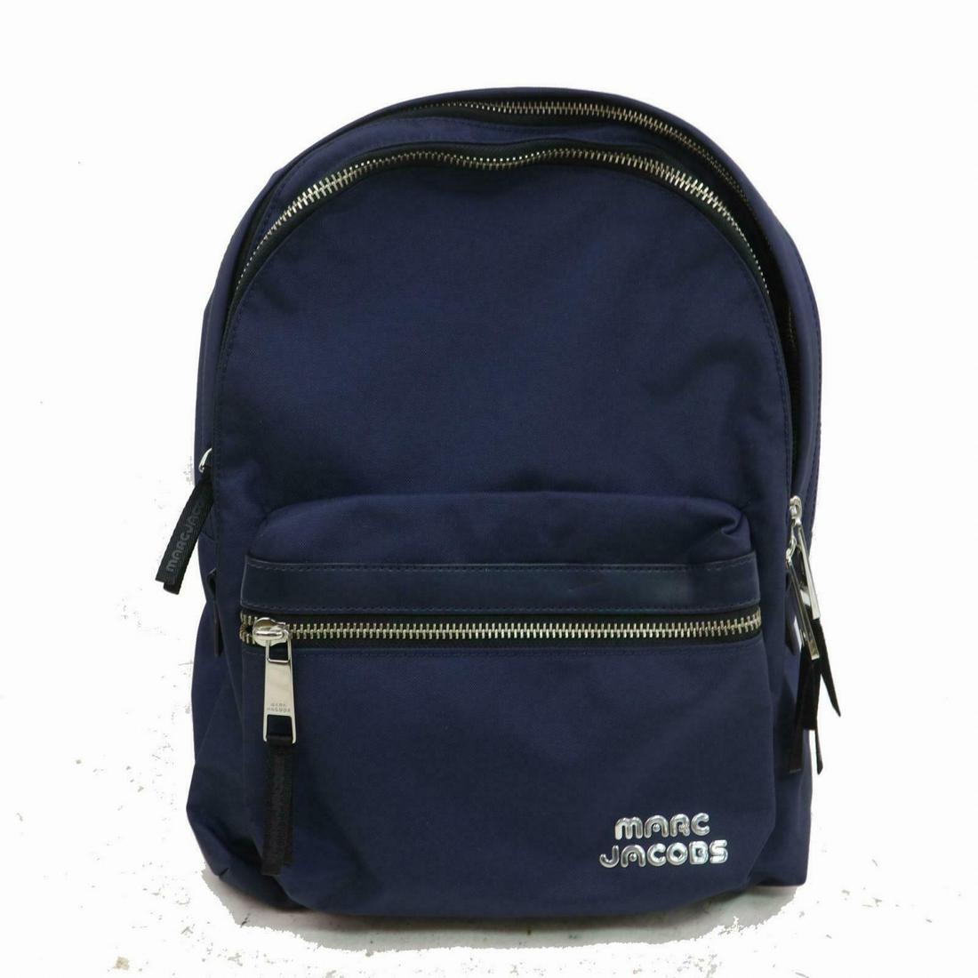 Authentic MARC JACOBS Nylon Back Pack: Brand: MARC JACOBS Material: Nylon Style: Back Pack Color: Navy Blue Size(inch): W11.8 inch(approx) /30 cm(approx) x H14.5 inch(approx) /37 cm(approx) x D5.11 inch(approx) /13 cm(approx) " / Strap Dro