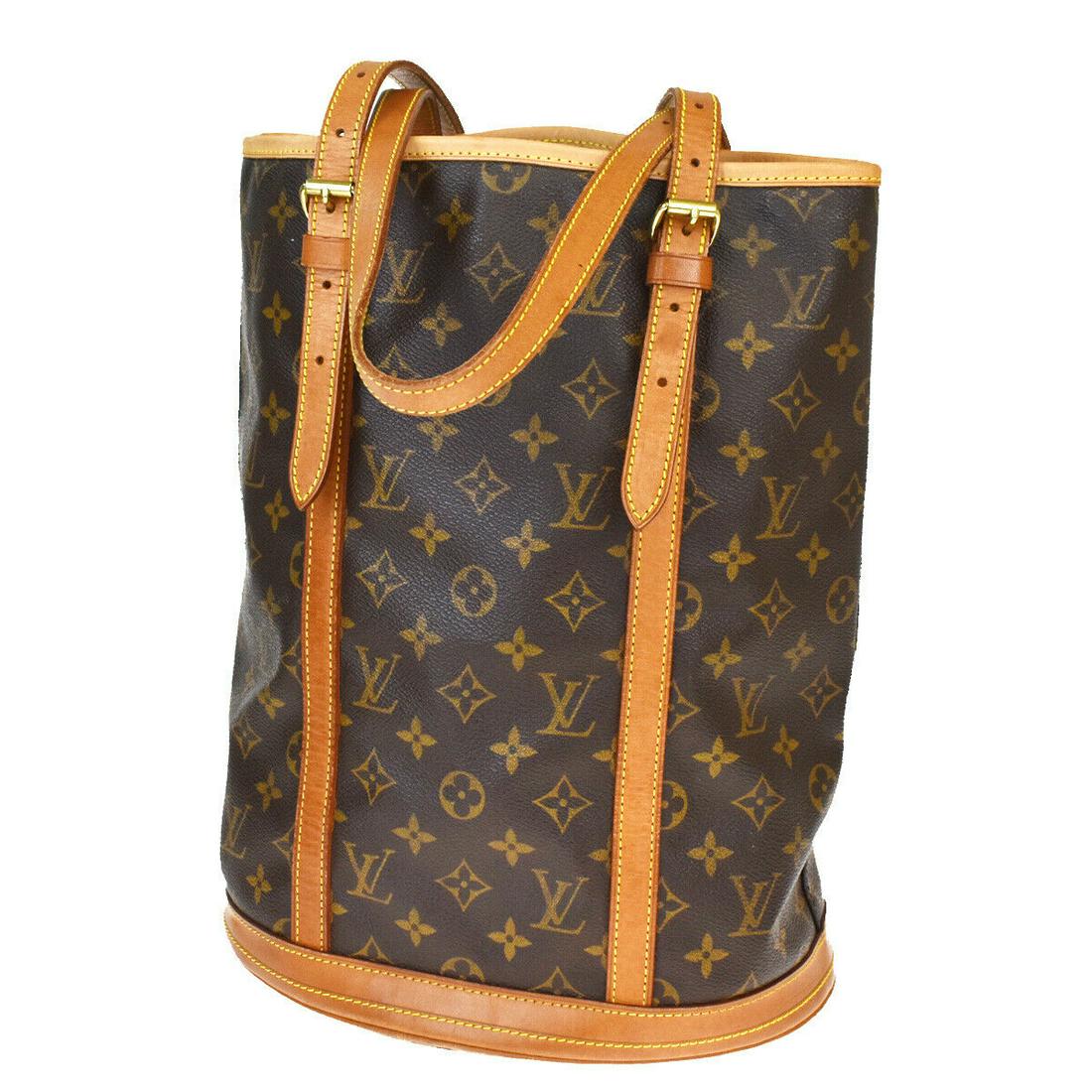 Authentic LOUIS VUITTON BUCKET GM Monogram,Leather: Brand: LOUIS VUITTON Material: Monogram,Leather Style: Shoulder bag Color: Brown Size(inch): W 10.6 x H 13.8 x D 7.9 "(approx.) Country of Origin: France Come with: - All Bidhaus items come with a 100