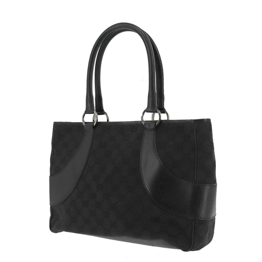 Authentic GUCCI VINTAGE Canvas, Leather Hand Bag: Brand: GUCCI Material: Canvas, Leather Style: Hand Bag Color: Black Size(Inch): H 9.0 x D 3.9 x L 12.2Handle: 16.1 Country of Origin: Italy Come with: - All Bidhaus items come with a 100% money-back a