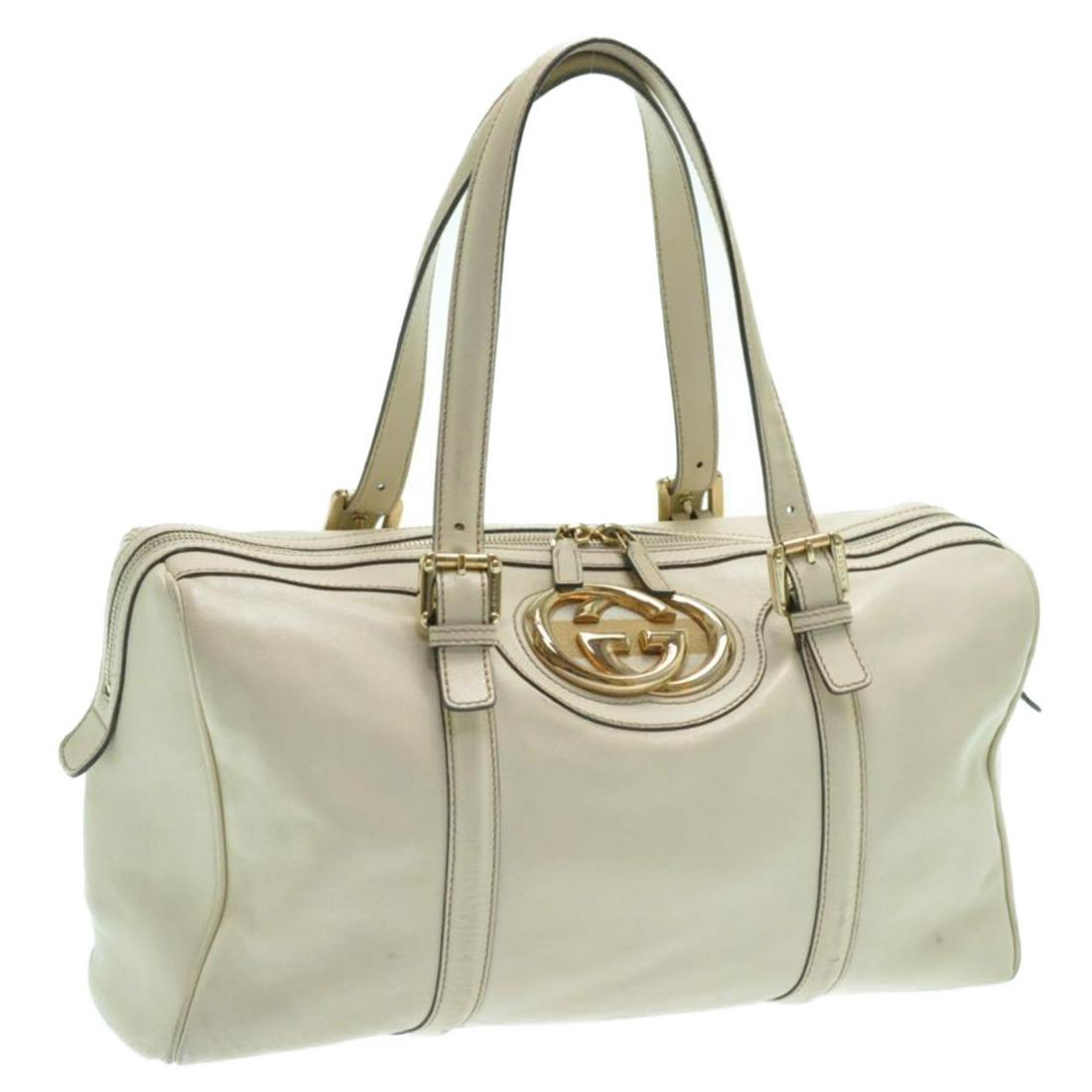 Authentic GUCCI Leather Boston Bag: Brand: GUCCI Material: Leather Style: Boston Bag Color: Cream Size(inch): W14.56 x H8.26 x D5.51inch(Approx) Country of Origin: Italy Accessory: There is no item box and dust bag. We will send only th