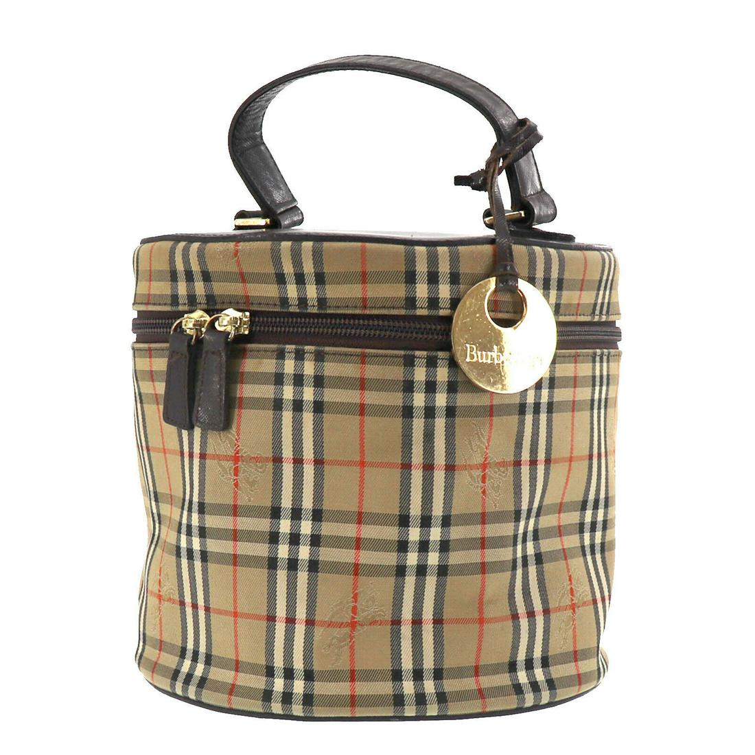 Authentic BURBERRYS Canvas Leather Hand Bag: Brand: BURBERRYS Material: Canvas Leather Style: Hand Bag Color: Beige, Brown Size(Inch): H 7.0 x D 7.6 x L 7.6Shoulder: 9.8 Come with: - All Bidhaus items come with a 100% money-back authenticity gua