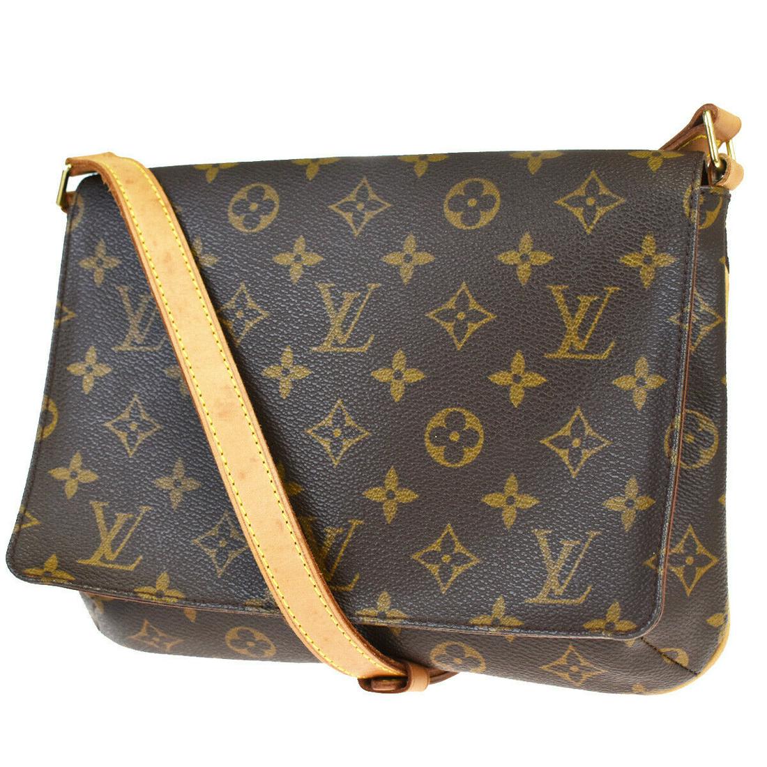 Authentic LOUIS VUITTON LEATHER Monogram, Leather: Brand: LOUIS VUITTON Material: Monogram, Leather Style: Shoulder Bag Color: Brown Size(inch): W 9.8 x H 7.1 x D 2 "(approx.) Country of Origin: Spain Come with: - All Bidhaus items come with a 100% mo